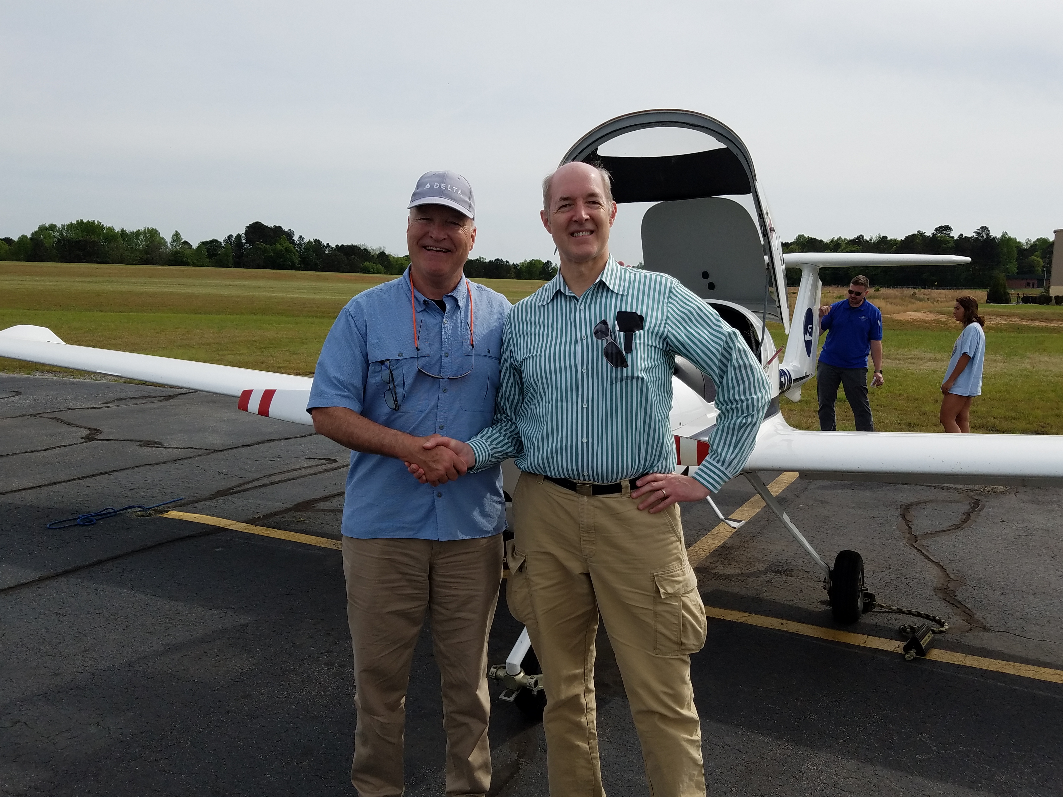 Ron, the FAA Examiner (who is an Airline Captain for Delta), congratulates me after our check ride together